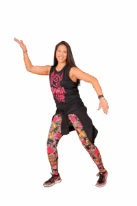 A Zumba instructor performs a routine.