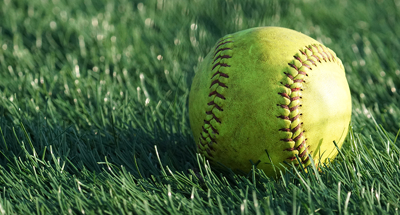 Softball in the grass.
