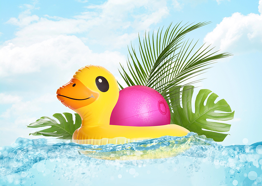 An inflatable duck floats in a pool.