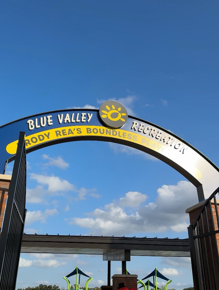 Blue and yellow entrance arch.